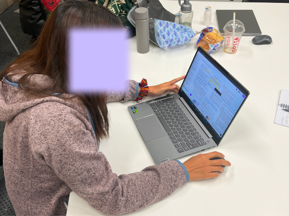 A person participating in a formative test using a laptop..